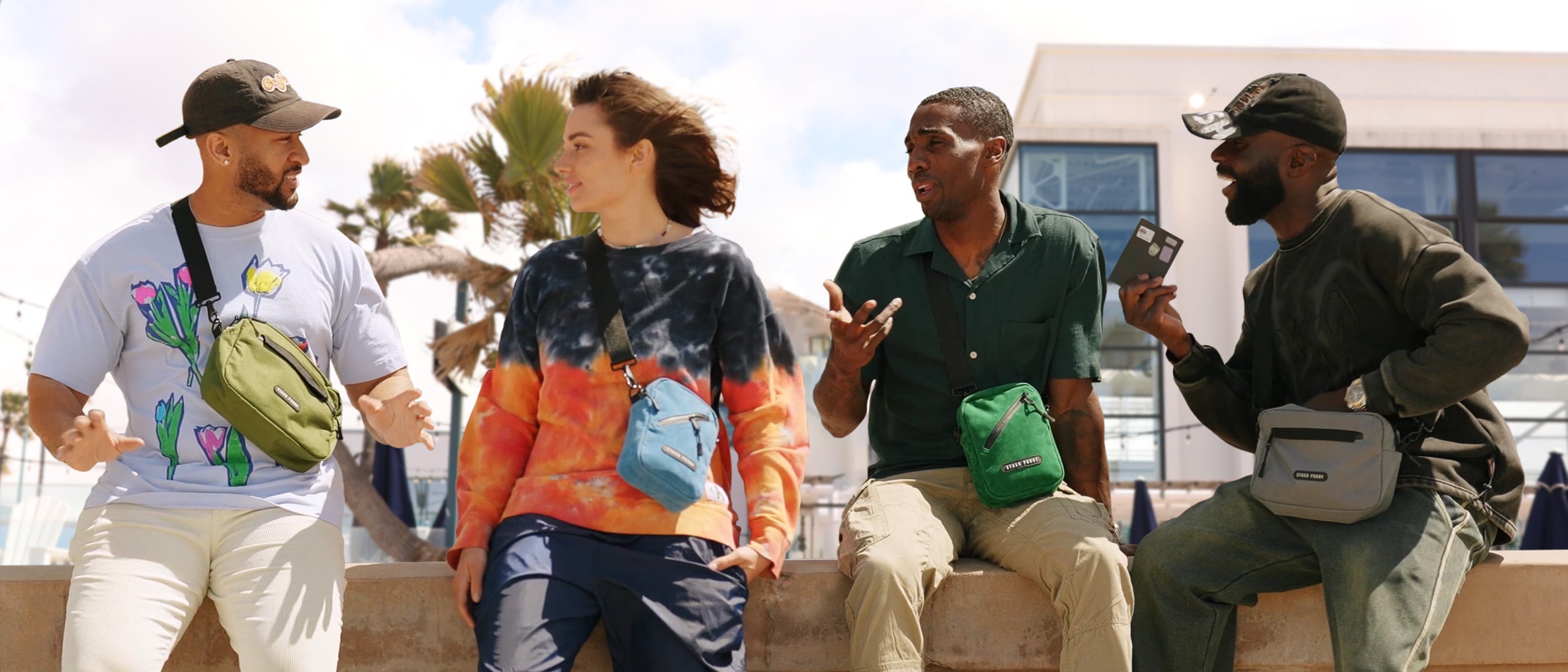 Group of people sitting on bench talking to each other carrying smell proof bag crossbody