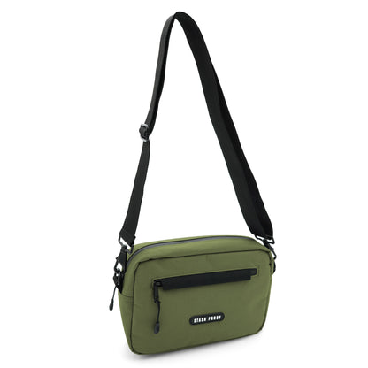 Front of the olive green Rover crossbody and shoulder bag with strap being suspended in air