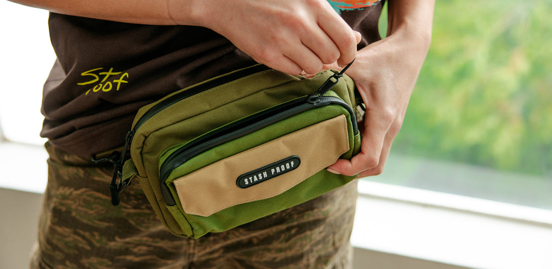 Woman wearing belt bag pulling waterproof zipper open