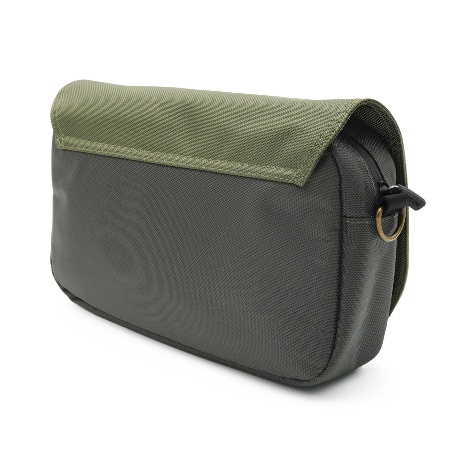 Close view of the Button Bag green and gray water-resistant polyester fabric and stitching