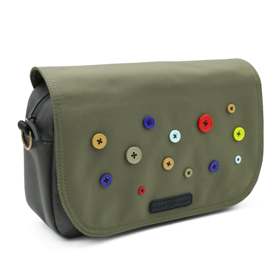 Side view of the Button Bag showing its water-resistant zipper construction