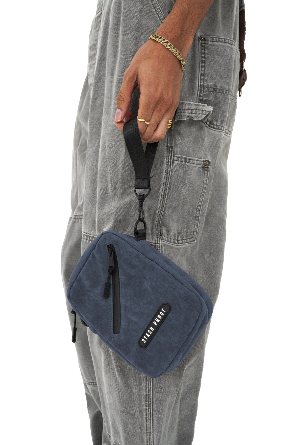Black suede Stash Bag configured for compact hands-free carry