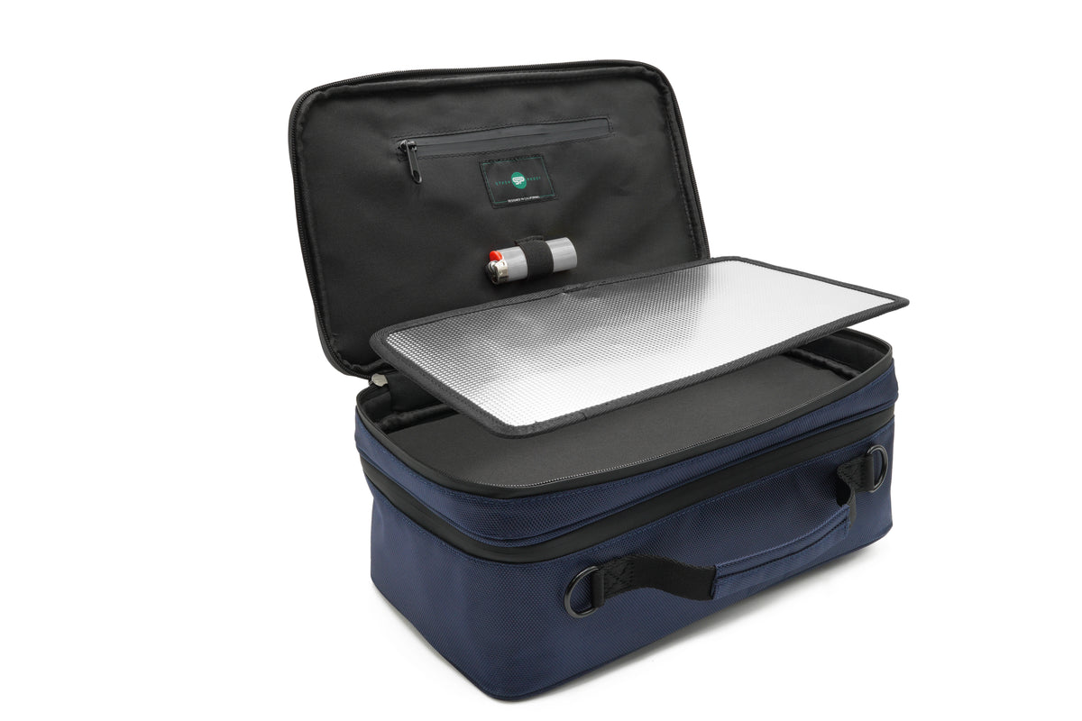 Open Stash Box showing the reflective removable tray and interior storage pockets