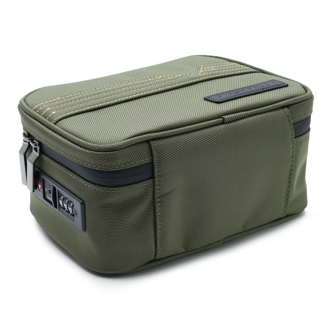 Close view of the built-in combination TSA lock and water-resistant zipper hardware on the olive green Stash Pack