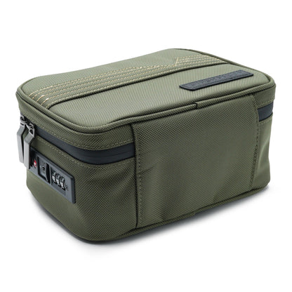 Green Stash Pack toiletry bag with TSA approved lock on a white background