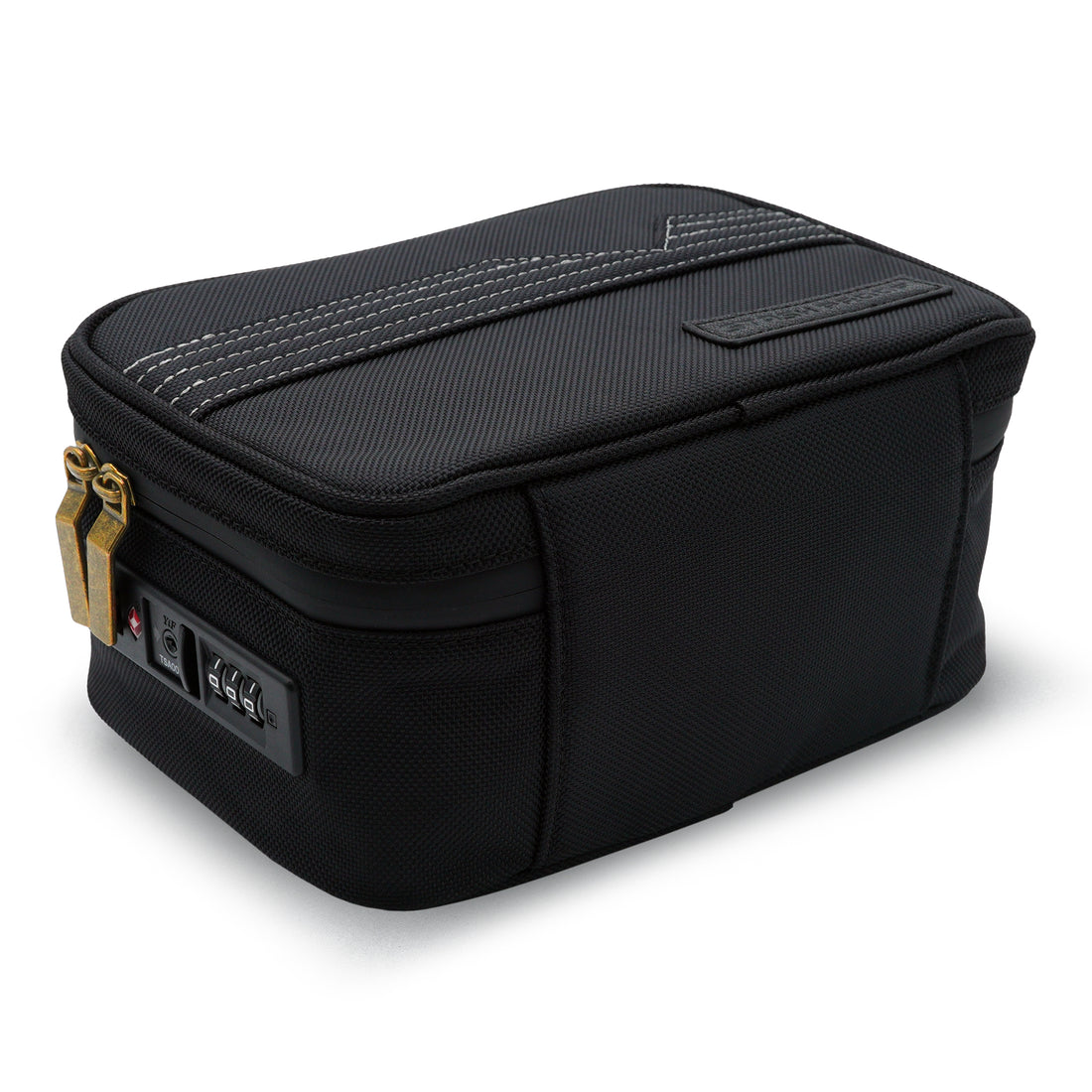 Close view of the built-in combination TSA lock and brass zipper hardware on the black Stash Pack