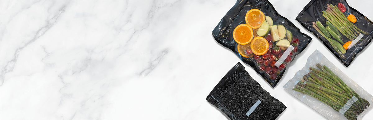 Plated meals with fruits, vegetables on a marble surface