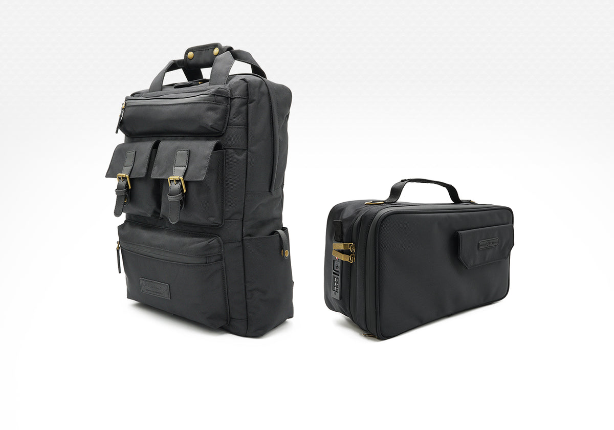 black backpack and black stash box storage case on white background