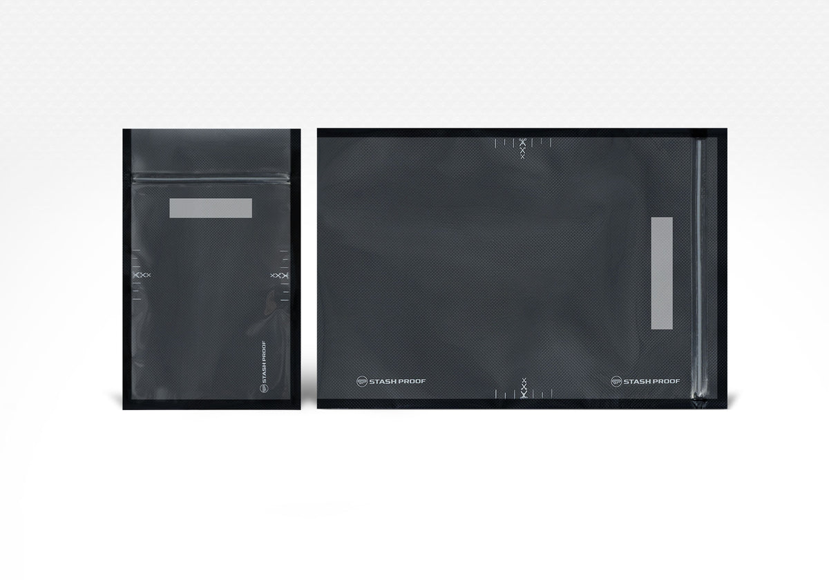 Two black and clear zipper vacuum seal bags on a white background