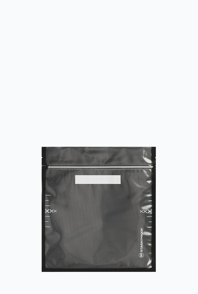 11 inch by 12 inch vacuum sealable storage bag in black and clear standing on white background