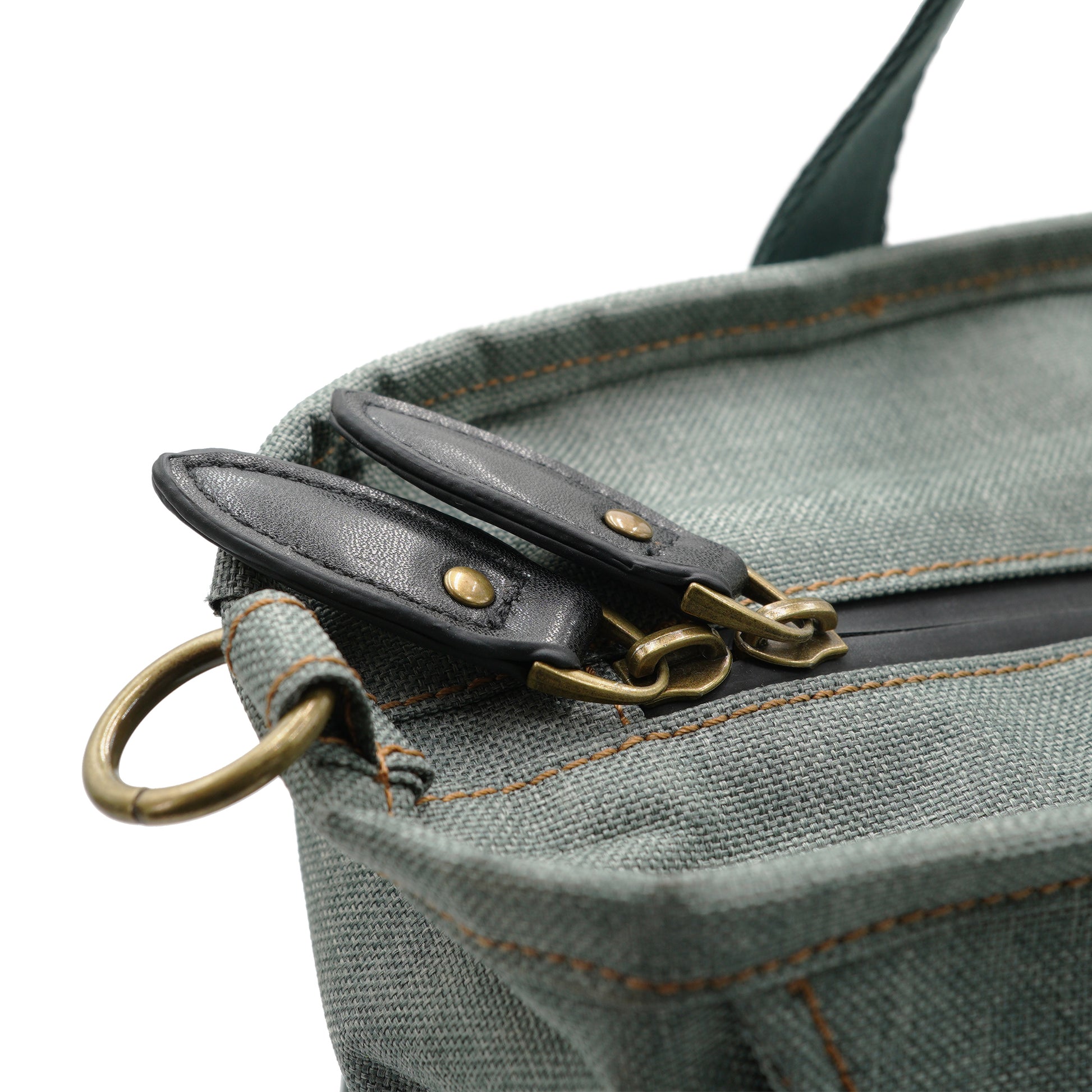 Close up of zippers on denim tote bag